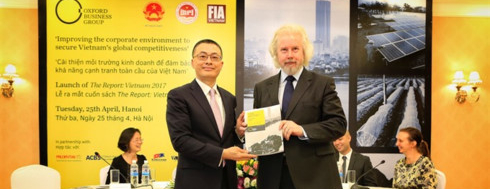 OBG Chairman Michael Benson-Colpi with the Assistant to the Minister of Foreign Affairs Vũ Quang Minh at the launching ceremony of The Report: Vietnam 2017